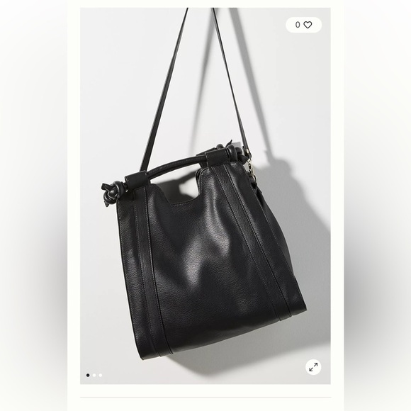 Anthropologie Handbags - Anthropologie small/tiny vegan leather bag new condition vegan leather